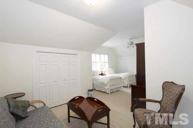 3710 Old Lassiter Mill Road Raleigh, NC 27609 - Photo 22 of 25 a living room with furniture and a window