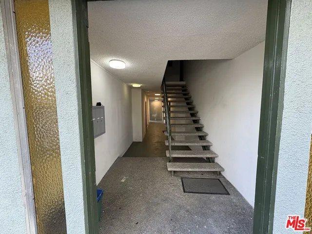 a view of entryway with stairs