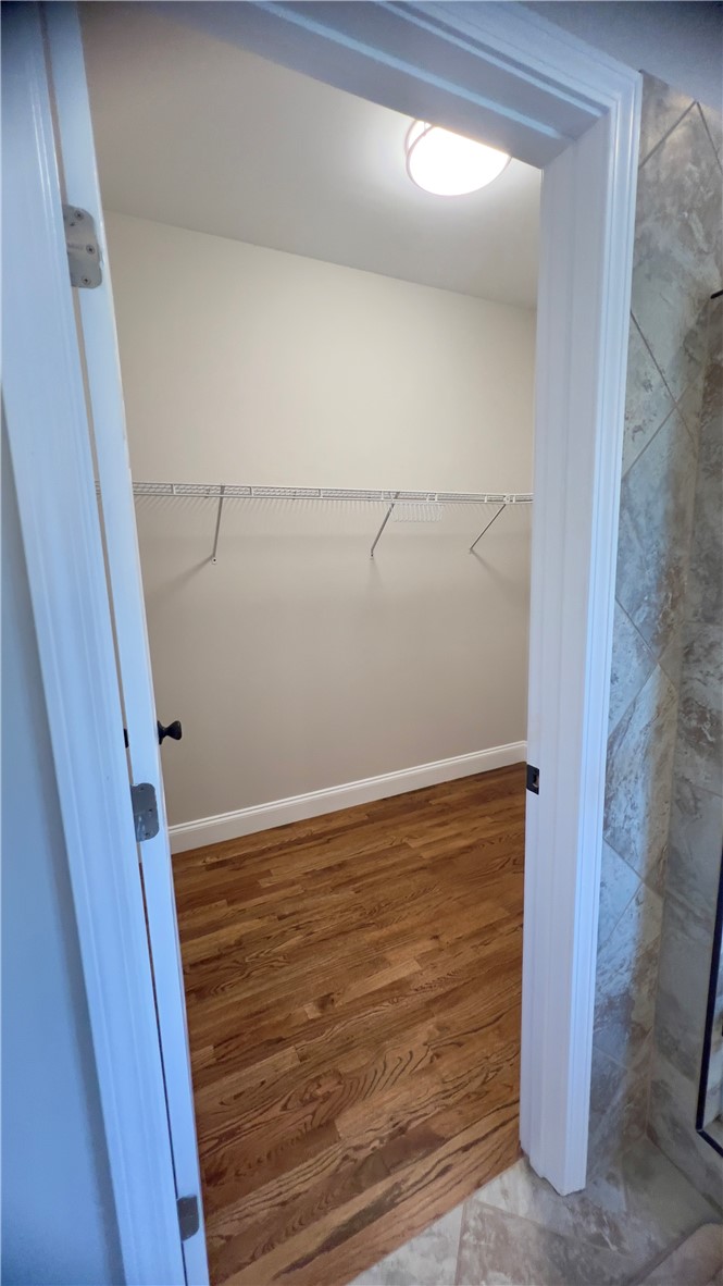 160 Hudgins Lake Road Townville, SC 29689 - Photo 19 of 41 A well-organized closet space with gleaming hardwood floors awaits your personal touch.