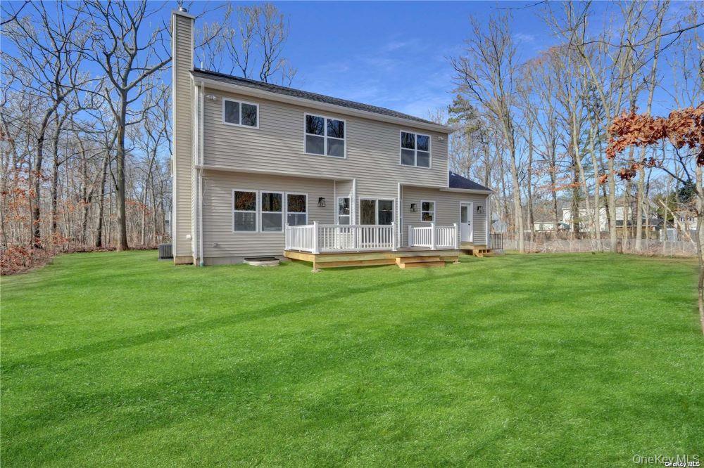 Lot 3 Westfield Road Coram, NY 11727 - Photo 23 of 25 a front view of house with yard and green space