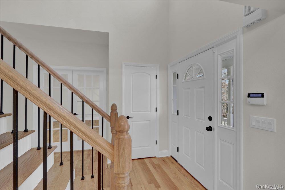 Lot 3 Westfield Road Coram, NY 11727 - Photo 25 of 25 a view of an entryway with wooden floor