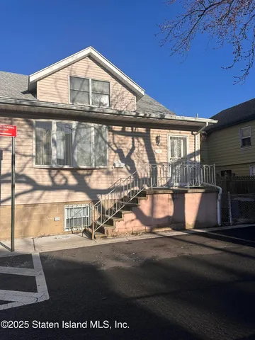 a view of a building with a street