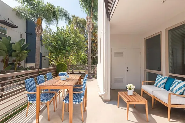 a outdoor dining space with furniture