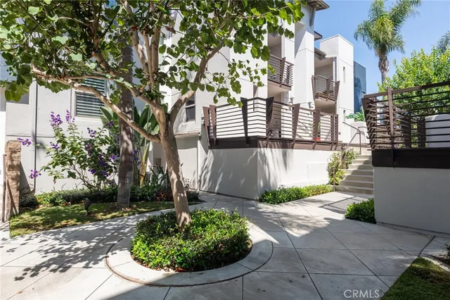 a view of a pathway with a house
