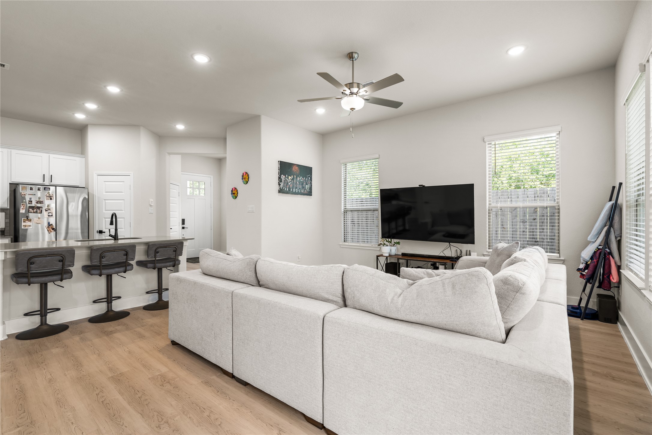 4001 Baja Lane Houston, TX 77045 - Photo 10 of 27 The seamless connection between the kitchen and living area creates a sense of openness that makes the home feel larger than its footprint, while still maintaining distinct spaces for gathering and relaxing.