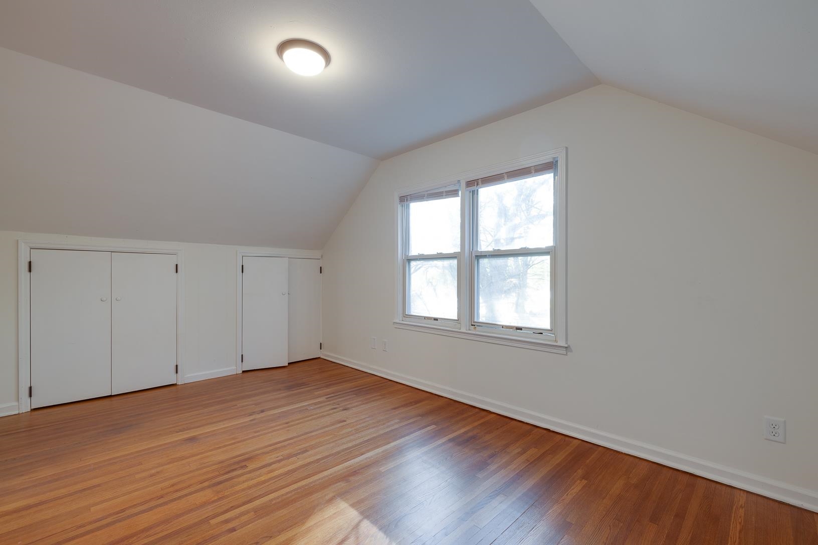2790 James Road Memphis, TN 38127 - Photo 13 of 19 an empty room with wooden floor and windows