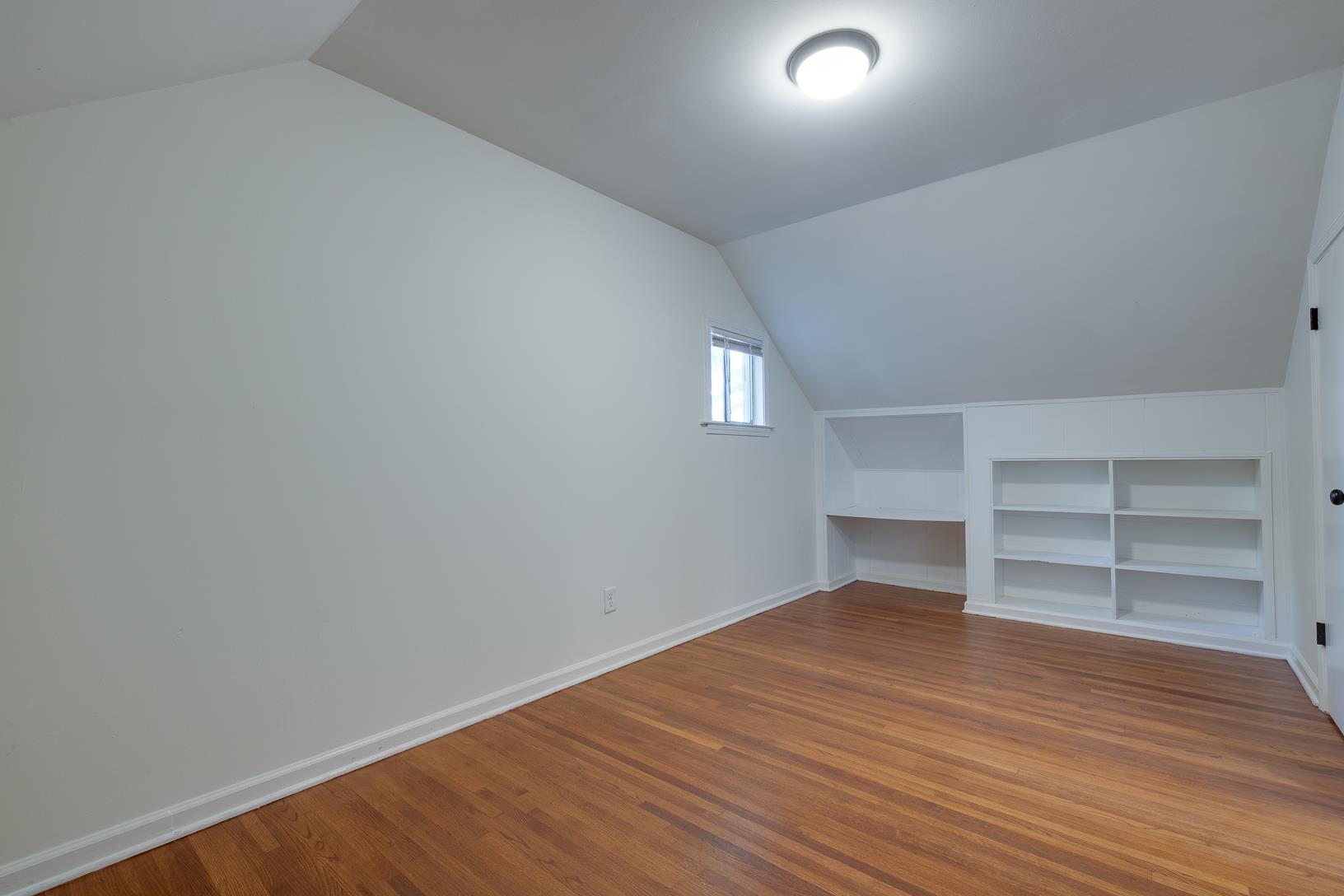 2790 James Road Memphis, TN 38127 - Photo 16 of 19 a view of an empty room with a window and wooden floor