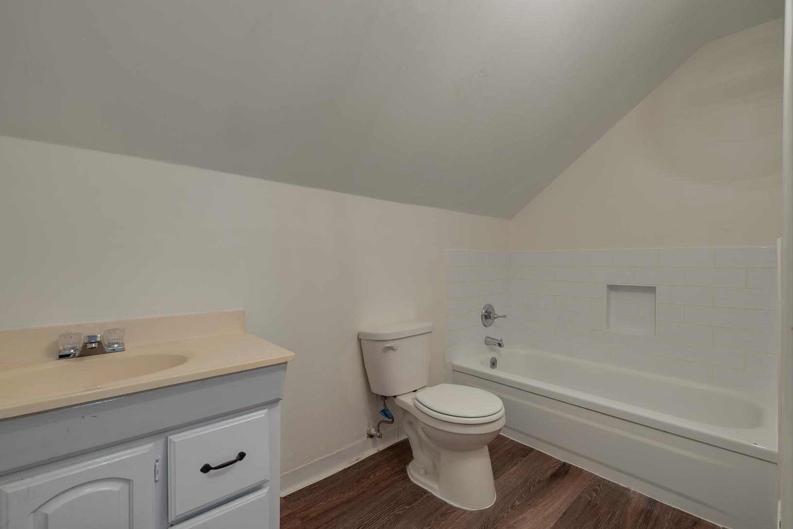 2790 James Road Memphis, TN 38127 - Photo 18 of 19 a white toilet sitting next to a bathroom sink