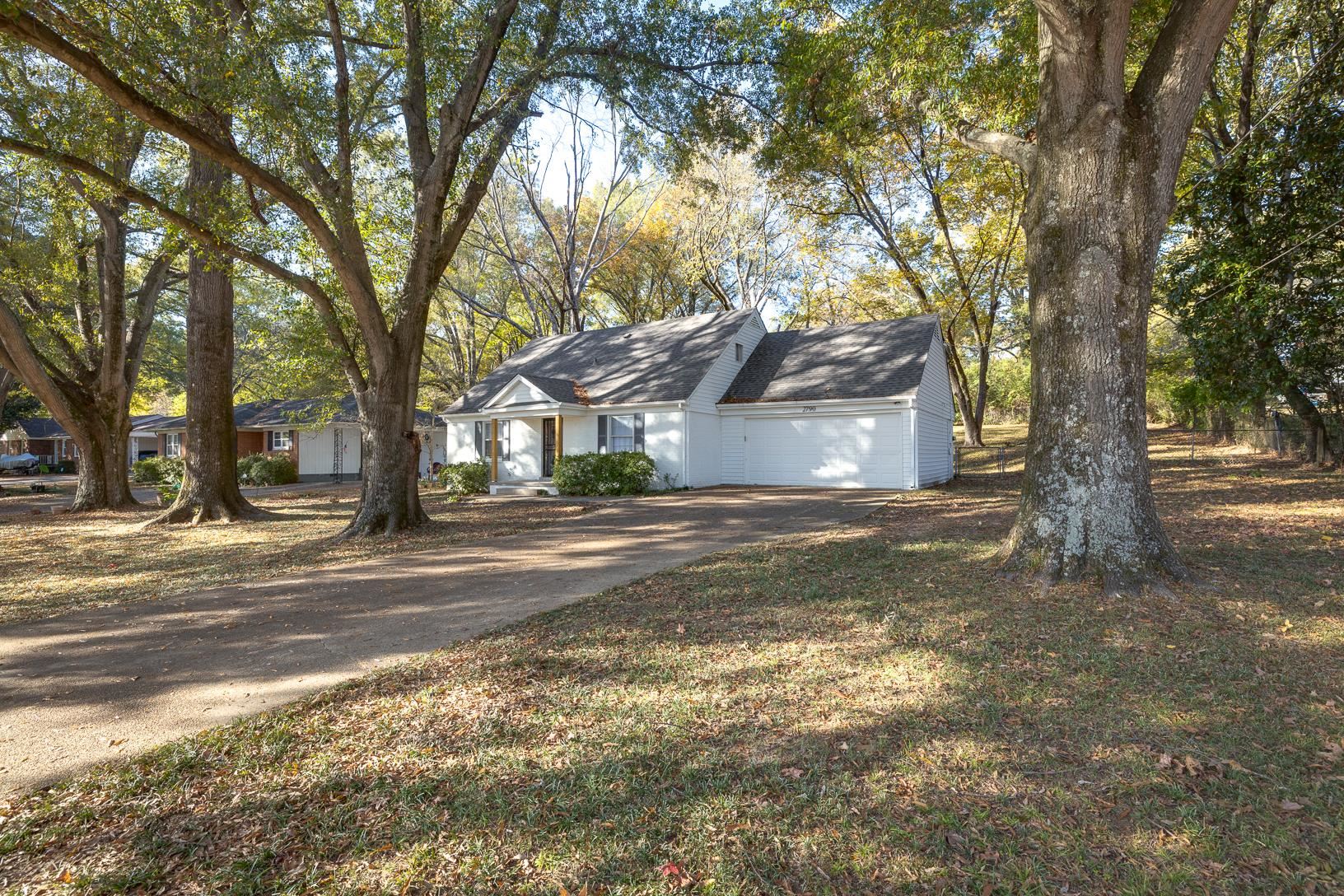 2790 James Road Memphis, TN 38127 - Photo 2 of 19 a view of street with large trees