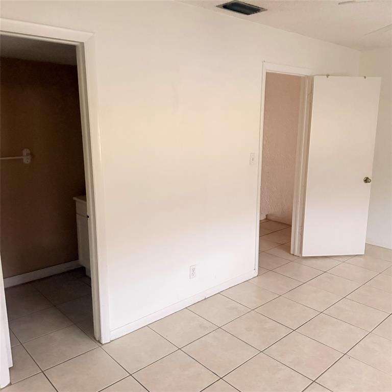 6518 Southwest 41st Street Davie, FL 33314 - Photo 5 of 9 an empty room with cabinet