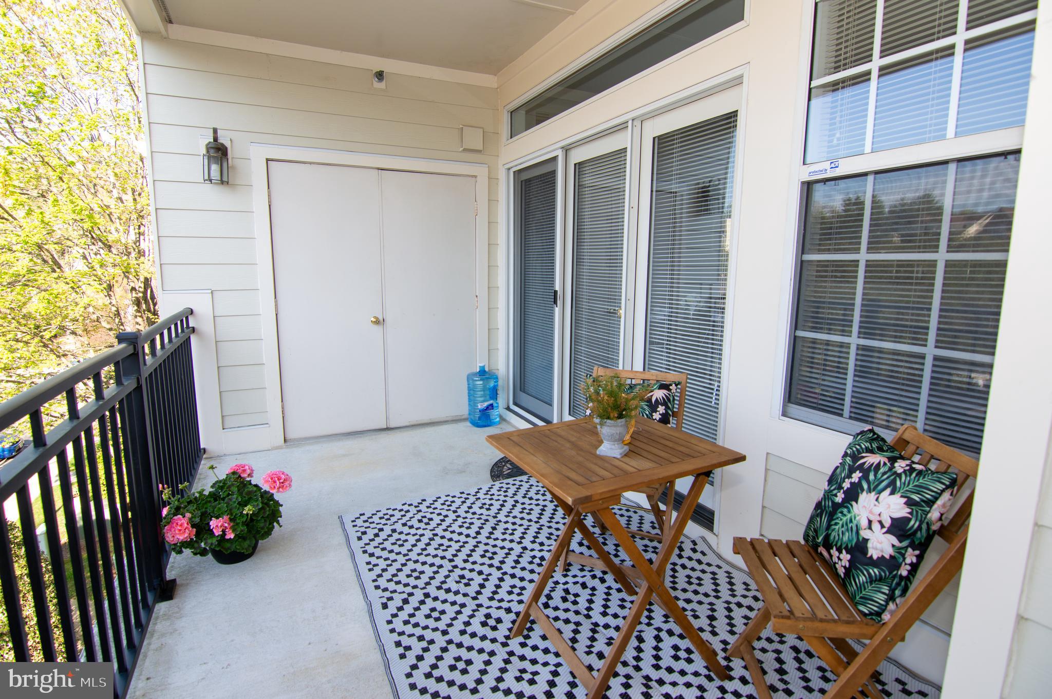 11304 Sundial Court, Unit C 910 Reston, VA 20194 - Photo 17 of 45 Balcony off Dining Room