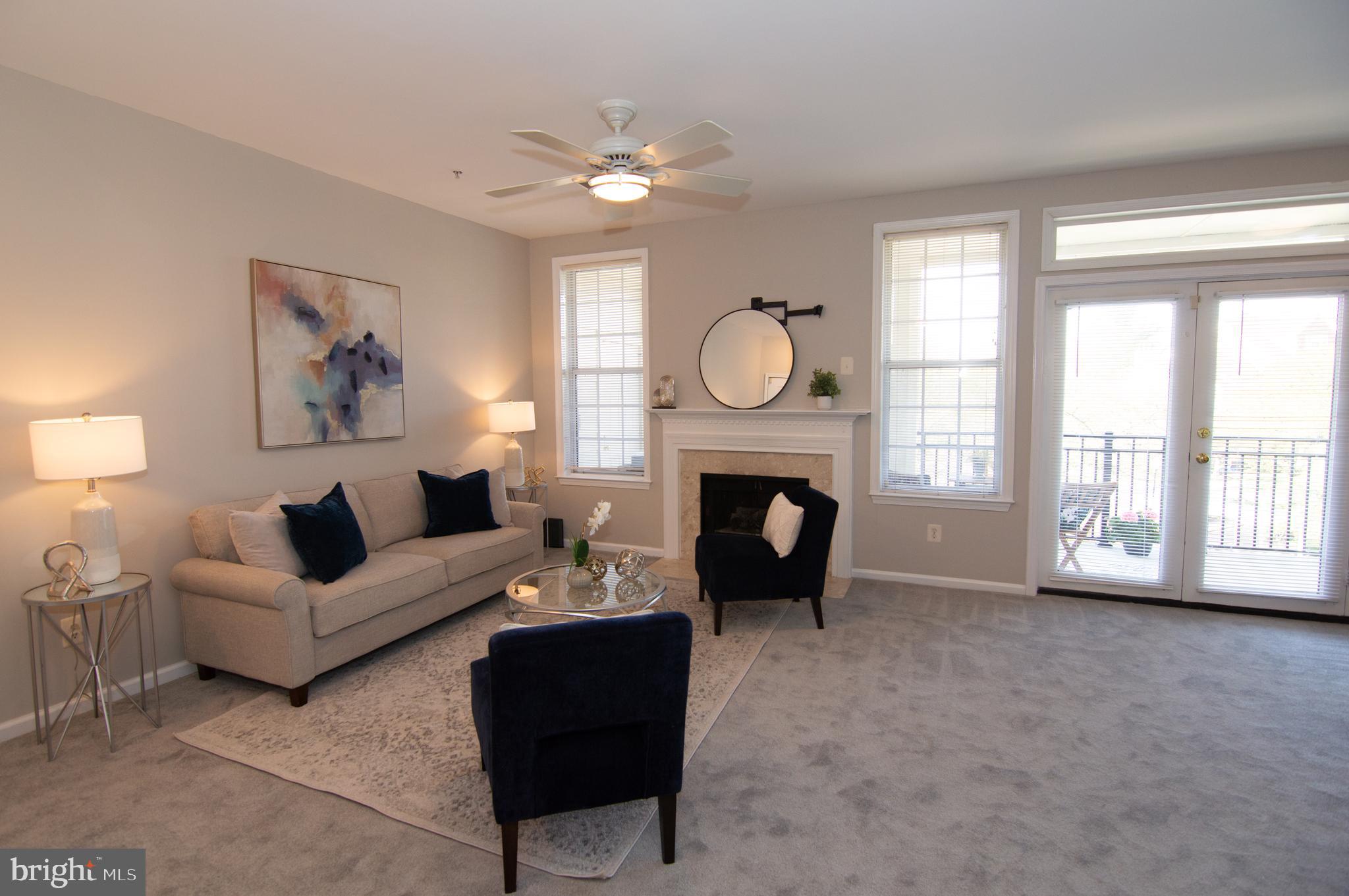 11304 Sundial Court, Unit C 910 Reston, VA 20194 - Photo 9 of 45 Living Room w/ Gas Fireplace