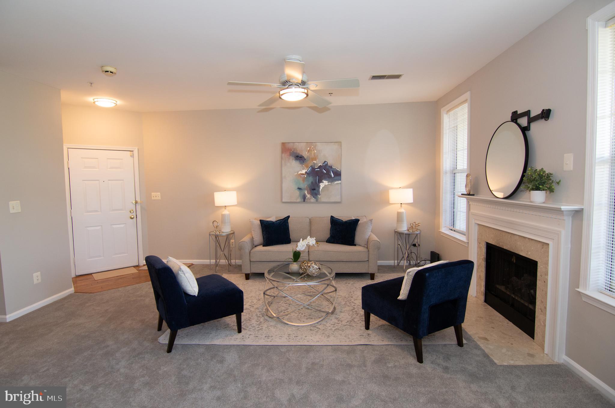 11304 Sundial Court, Unit C 910 Reston, VA 20194 - Photo 10 of 45 Living Room w/ Gas Fireplace
