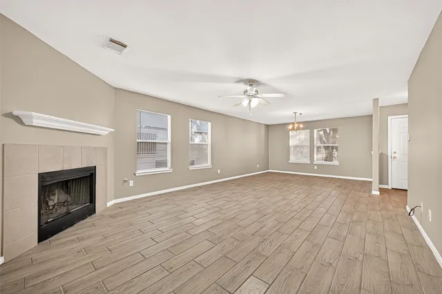 a view of livingroom with hardwood floor and fireplace