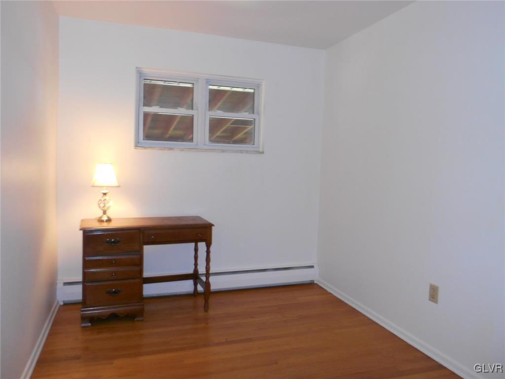 851 Elm Road Hellertown, PA 18055 - Photo 12 of 17 a room with a table and chair