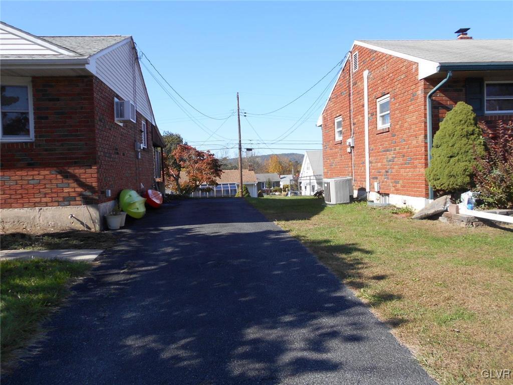 851 Elm Road Hellertown, PA 18055 - Photo 13 of 17 a view of a house with a yard