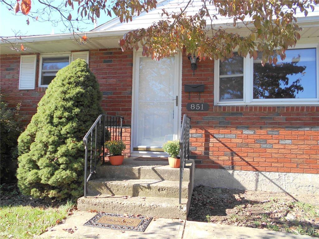 851 Elm Road Hellertown, PA 18055 - Photo 3 of 17 a backyard of a house with potted plants