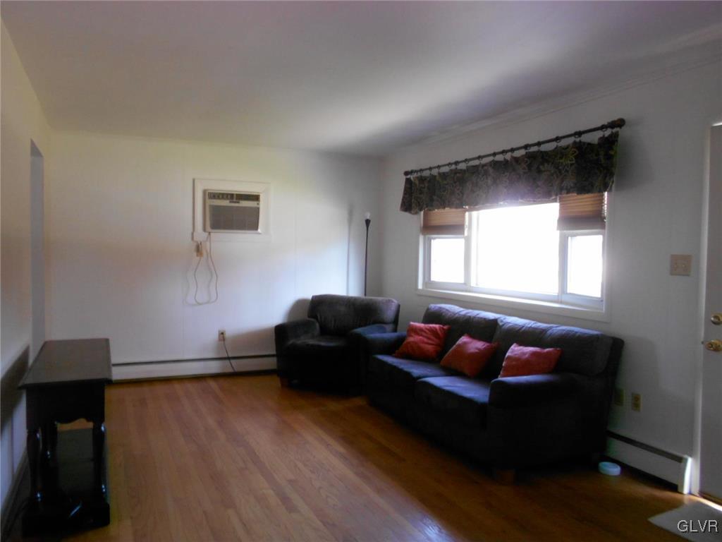 851 Elm Road Hellertown, PA 18055 - Photo 4 of 17 a living room with furniture and a window