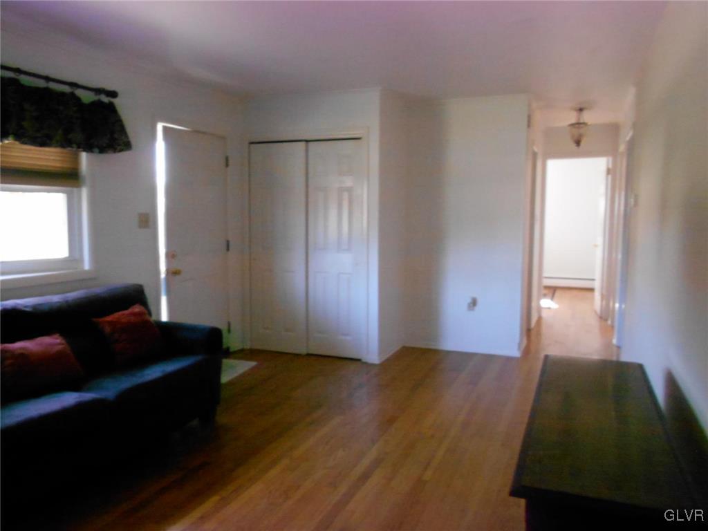 851 Elm Road Hellertown, PA 18055 - Photo 5 of 17 a living room with furniture and a flat screen tv