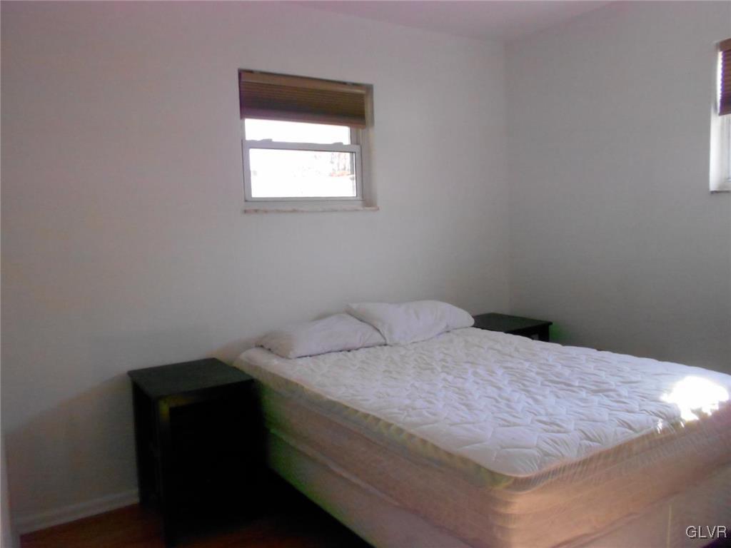 851 Elm Road Hellertown, PA 18055 - Photo 10 of 17 a bedroom with a bed and a window