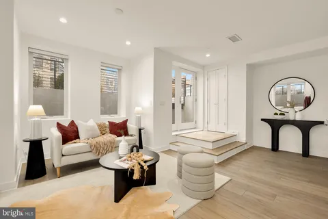 a living room with furniture and window