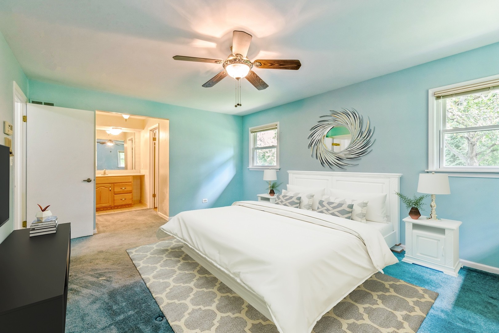 2339 Old Hicks Road Long Grove, IL 60047 - Photo 12 of 27 a bedroom with a bed and a chandelier