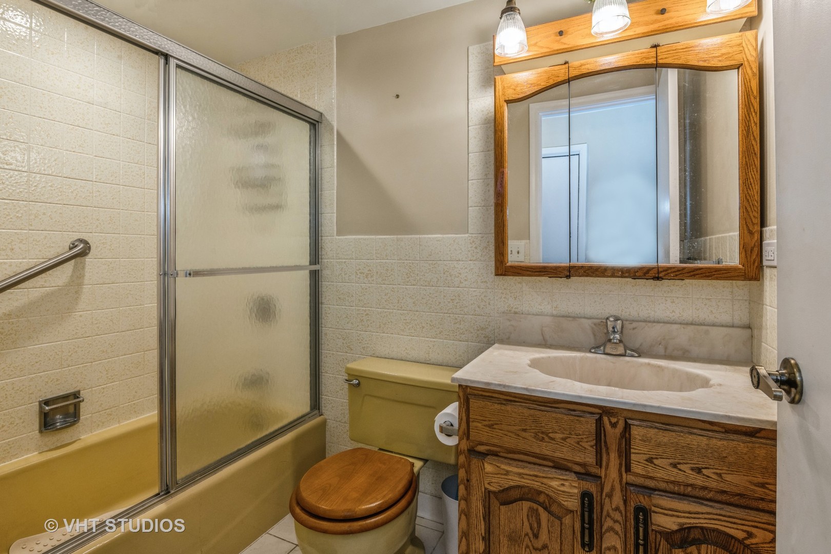 2339 Old Hicks Road Long Grove, IL 60047 - Photo 17 of 27 a bathroom with a sink a toilet and shower