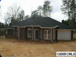 2530 Whitley Road Fort Mill, SC 29708 - Photo 6 of 7 a front view of a house with parking space