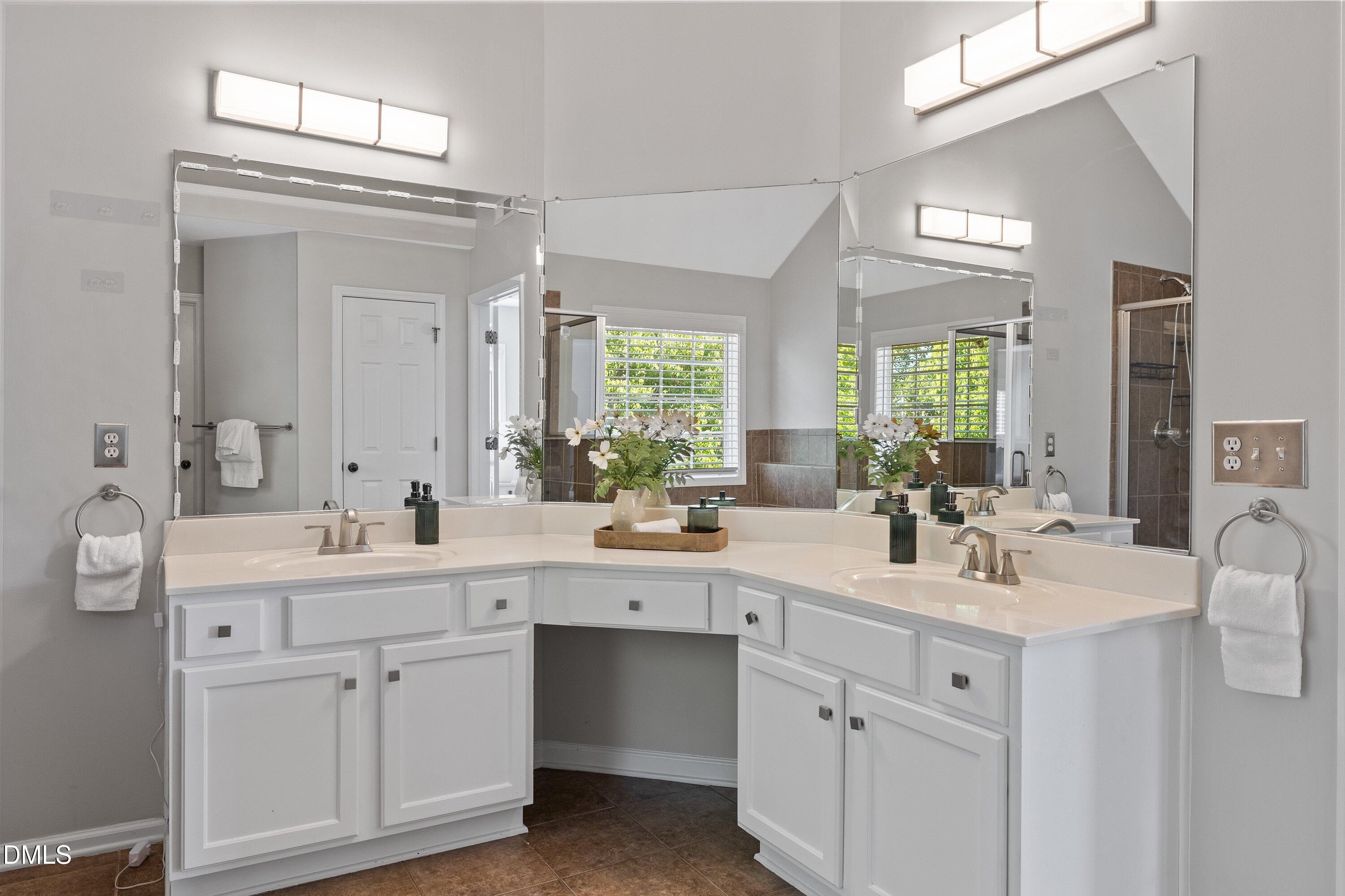 3717 Windmeade Road Wake Forest, NC 27587 - Photo 32 of 51 a view with white cabinets a sink and dishwasher