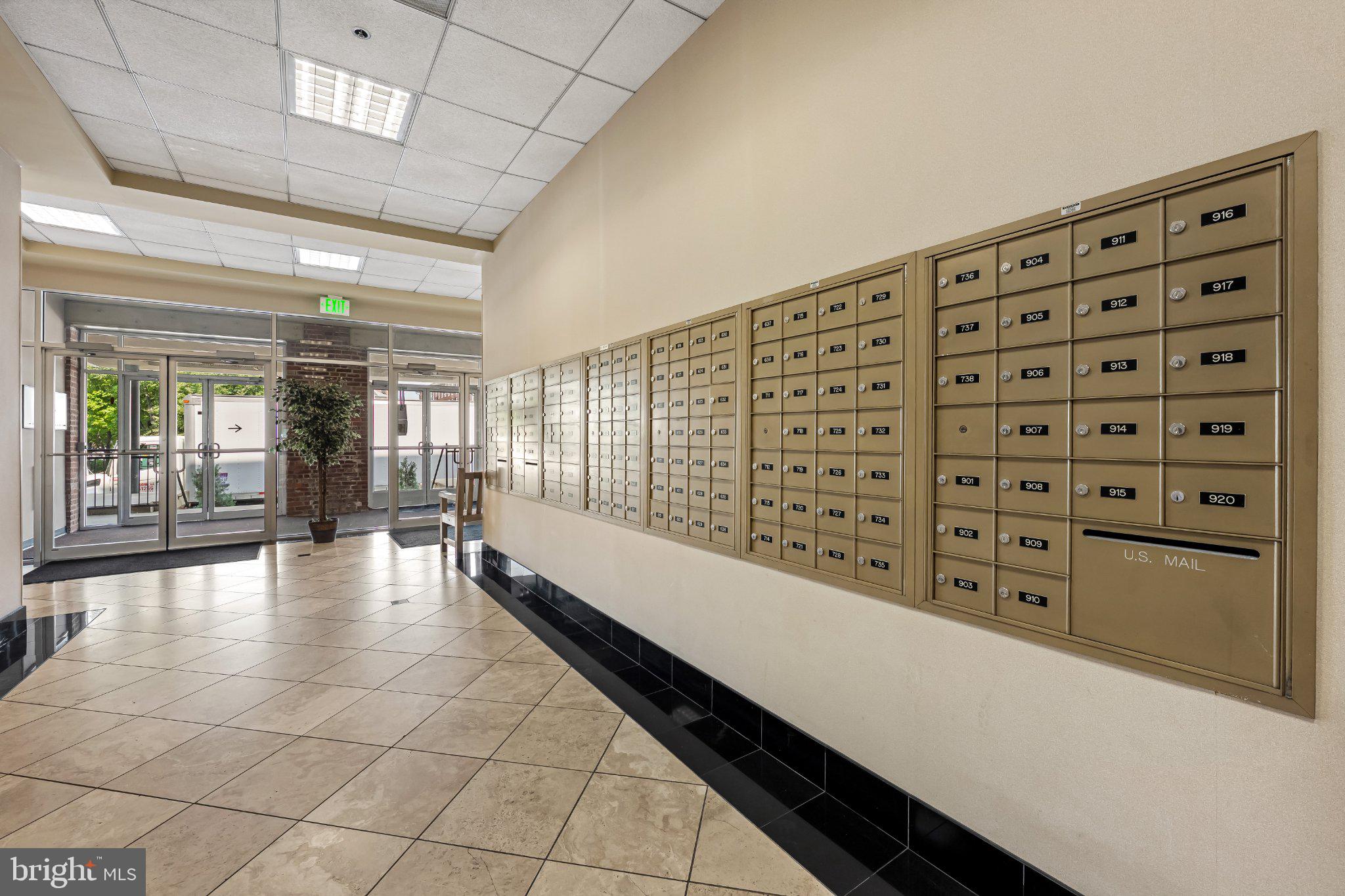 2702 Lighthouse Point East, Unit 738 Baltimore, MD 21224 - Photo 33 of 33 Modern mailroom with sleek design.