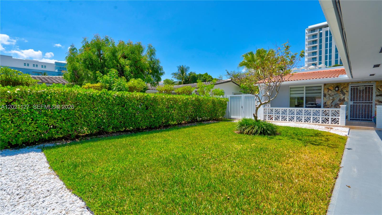 3611 Southwest 23rd Street Miami, FL 33145 - Photo 36 of 56 Front yard and pathway from extrance to 3613 entryway