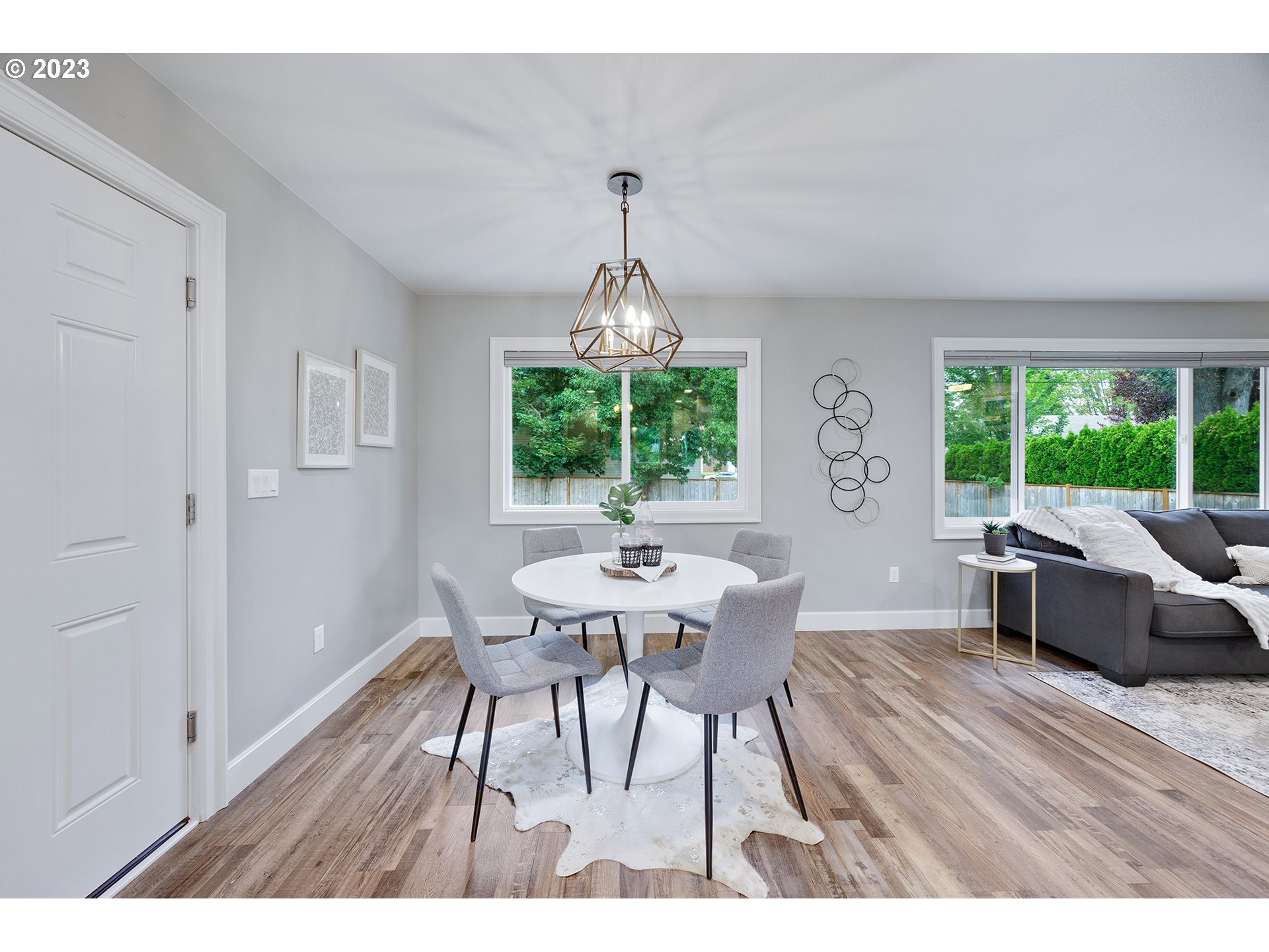 1427 Southeast 109th Avenue Portland, OR 97216 - Photo 13 of 44 a dining room with furniture window wooden floor