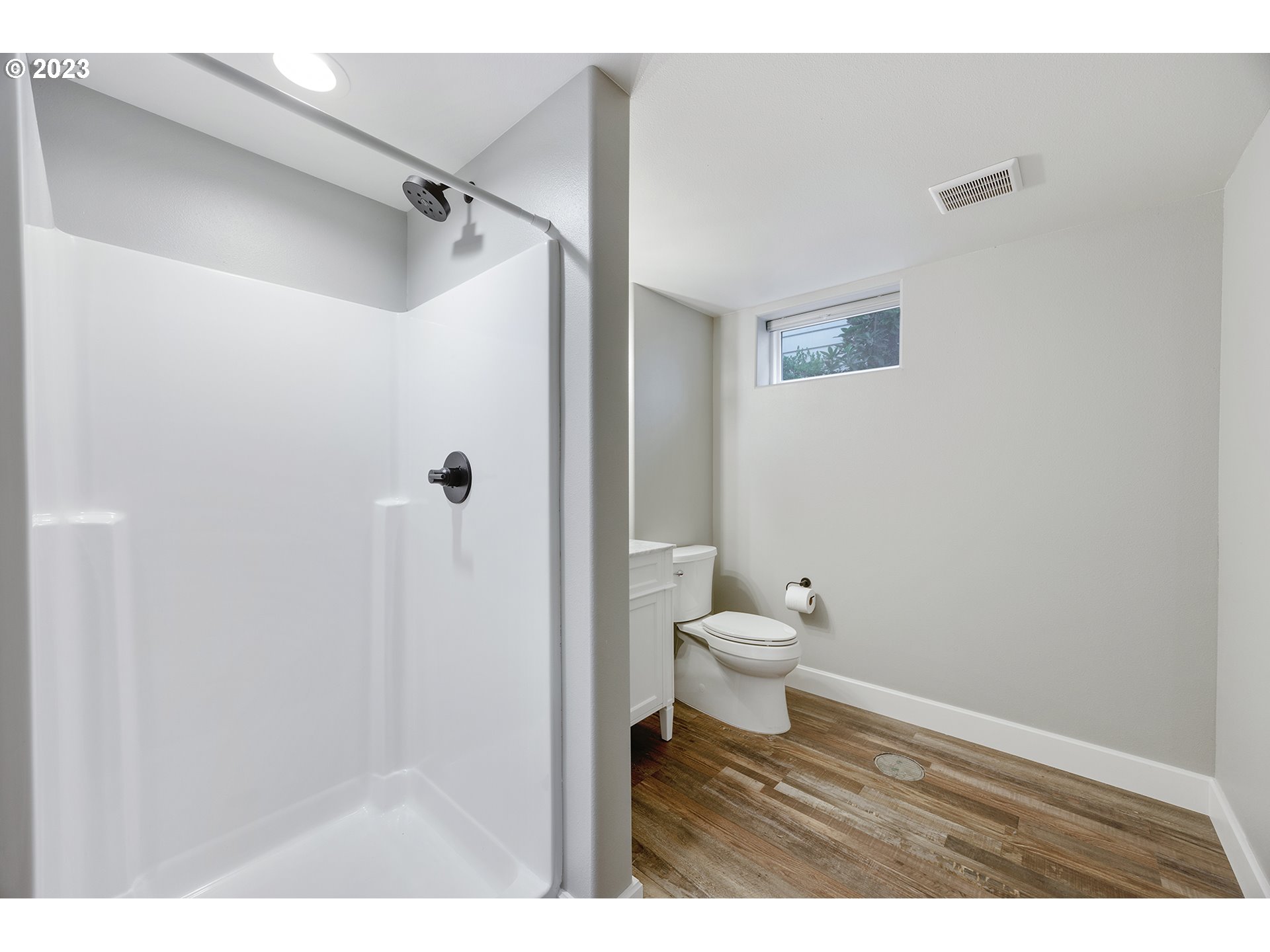 1427 Southeast 109th Avenue Portland, OR 97216 - Photo 34 of 44 a bathroom with a toilet and a shower