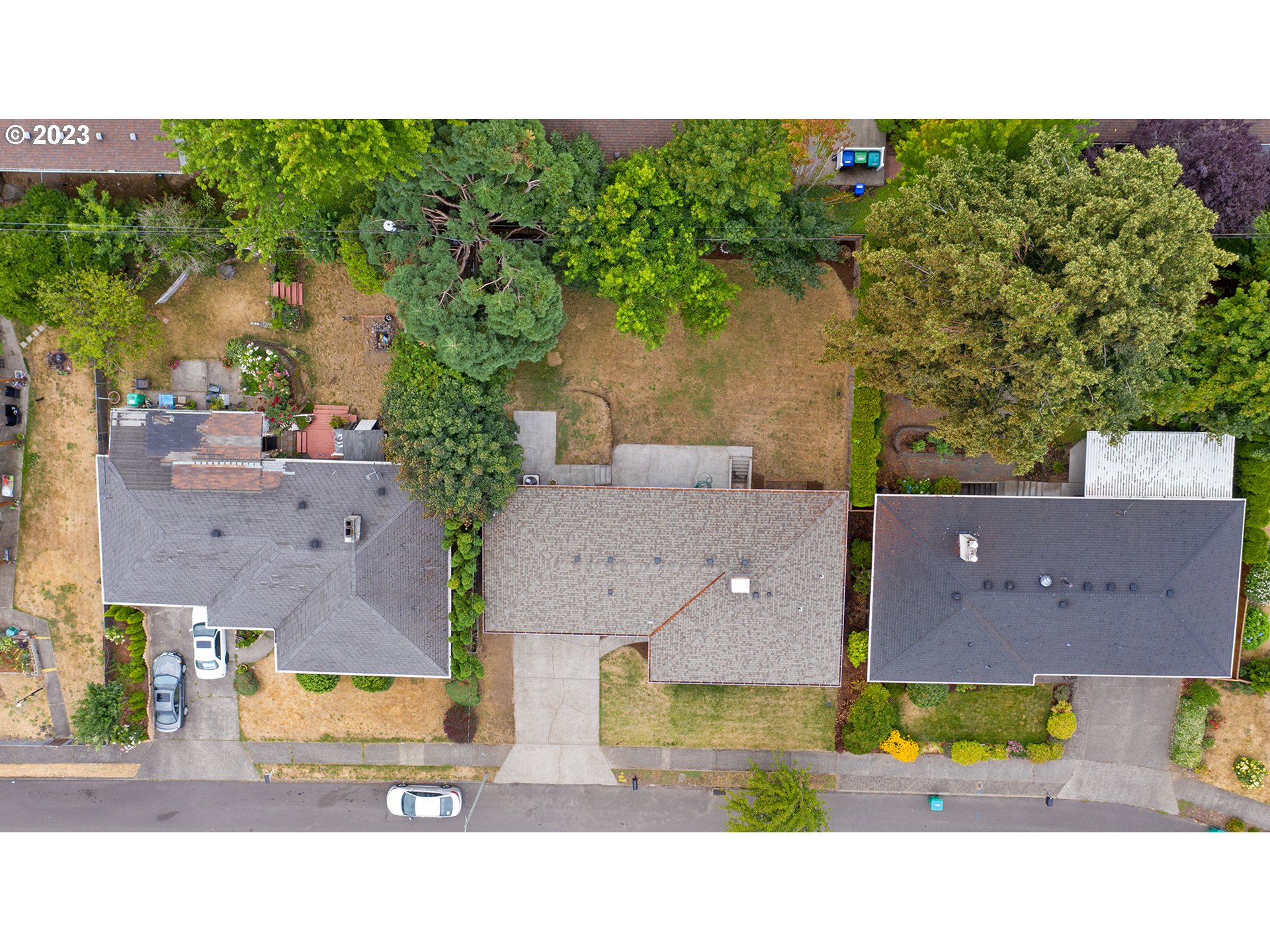 1427 Southeast 109th Avenue Portland, OR 97216 - Photo 44 of 44 an aerial view of a house with a yard swimming pool and outdoor seating