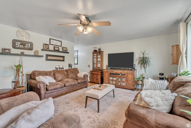 7470 Ramanee Drive Midvale, UT 84047 - Photo 6 of 29 Living area featuring ceiling fan