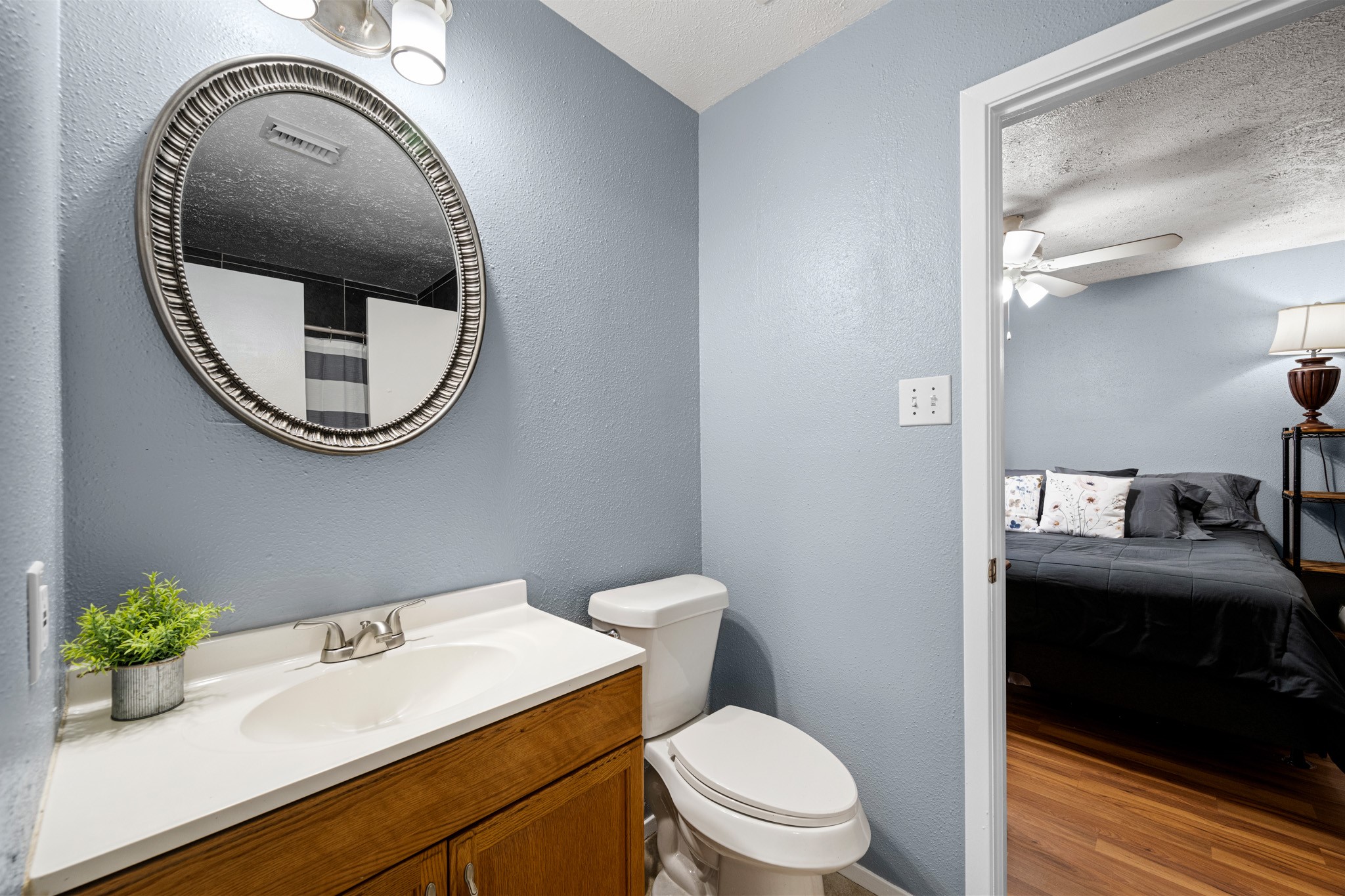 1804 Spruce Drive Rosenberg, TX 77471 - Photo 17 of 29 a bathroom with a sink mirror and toilet