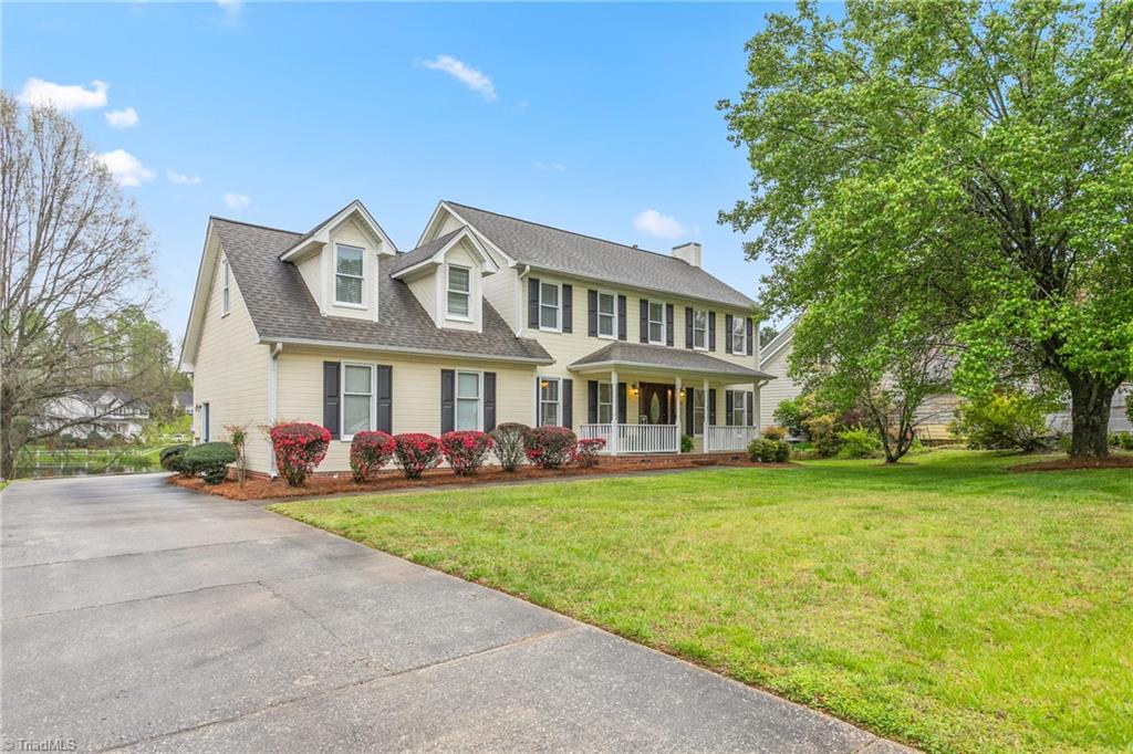 3103 Spring Mill Road Greensboro, NC 27406 - Photo 2 of 44 Generous driveway and back load garage
