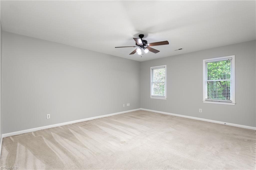 3103 Spring Mill Road Greensboro, NC 27406 - Photo 21 of 44 Spacious primary bedroom
