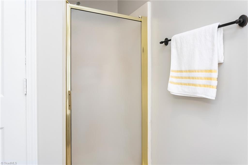 3103 Spring Mill Road Greensboro, NC 27406 - Photo 26 of 44 walk in shower and water closet