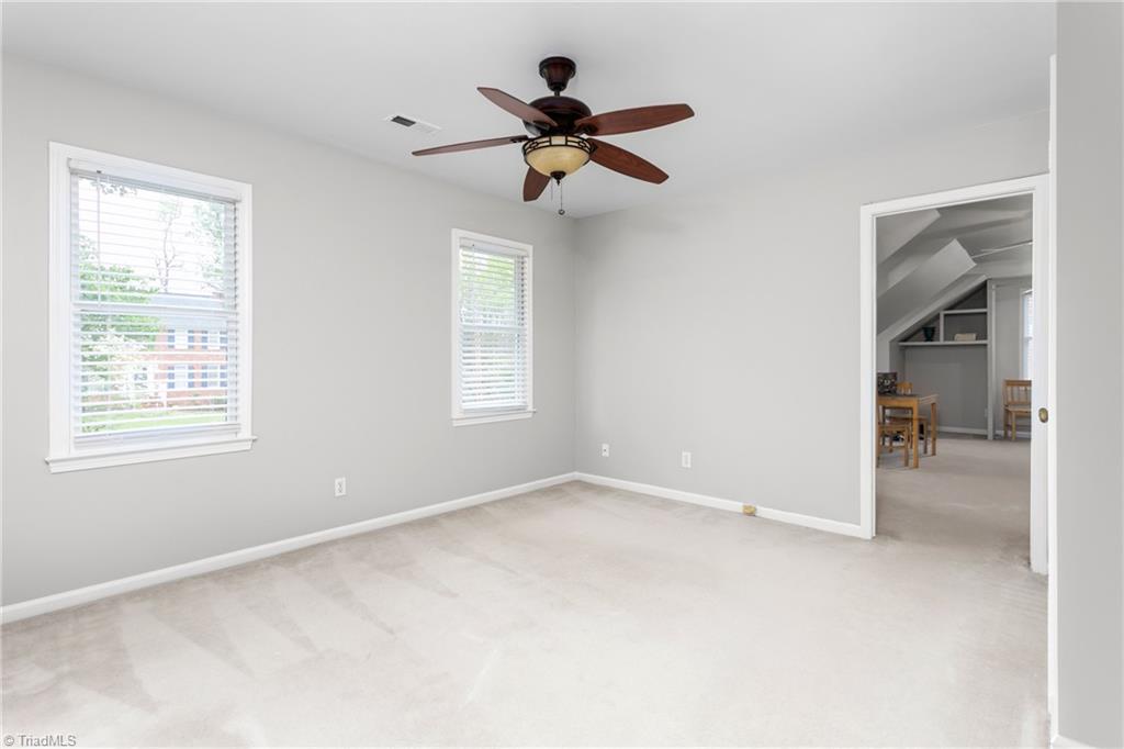3103 Spring Mill Road Greensboro, NC 27406 - Photo 30 of 44 Third bedroom is spacious and has access to the bonus room