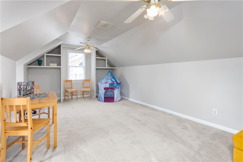 3103 Spring Mill Road Greensboro, NC 27406 - Photo 31 of 44 Bonus room or 4th bedroom. what a fun space to turn into a playroom or home gym.