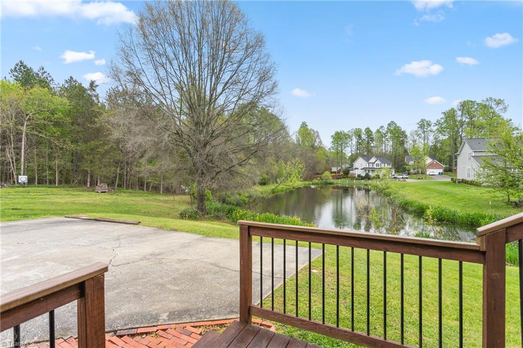 3103 Spring Mill Road Greensboro, NC 27406 - Photo 37 of 44 extra patio space for the grill while enjoying nature