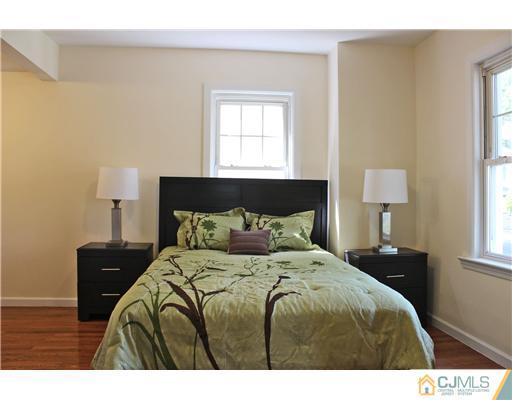 33 Meckes Street Springfield, NJ 07081 - Photo 13 of 25 a bedroom with a bed and a window