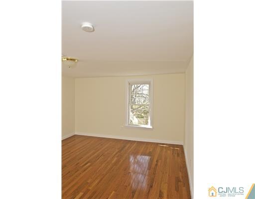 33 Meckes Street Springfield, NJ 07081 - Photo 20 of 25 a view of an empty room with a window
