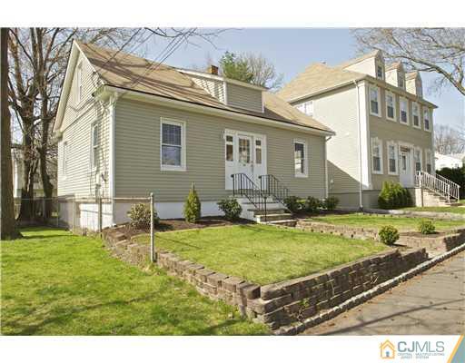 33 Meckes Street Springfield, NJ 07081 - Photo 3 of 25 a view of a house with swimming pool