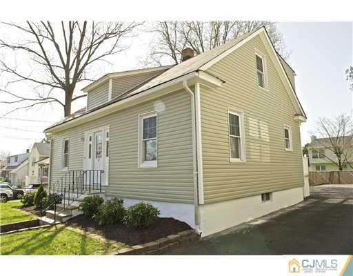 33 Meckes Street Springfield, NJ 07081 - Photo 4 of 25 a view of a house with a yard