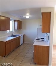 1448 Star Road, Unit 2 Pahrump, NV 89048 - Photo 3 of 10 A well-lit culinary space offers a functional layout and ample cabinetry for storage.