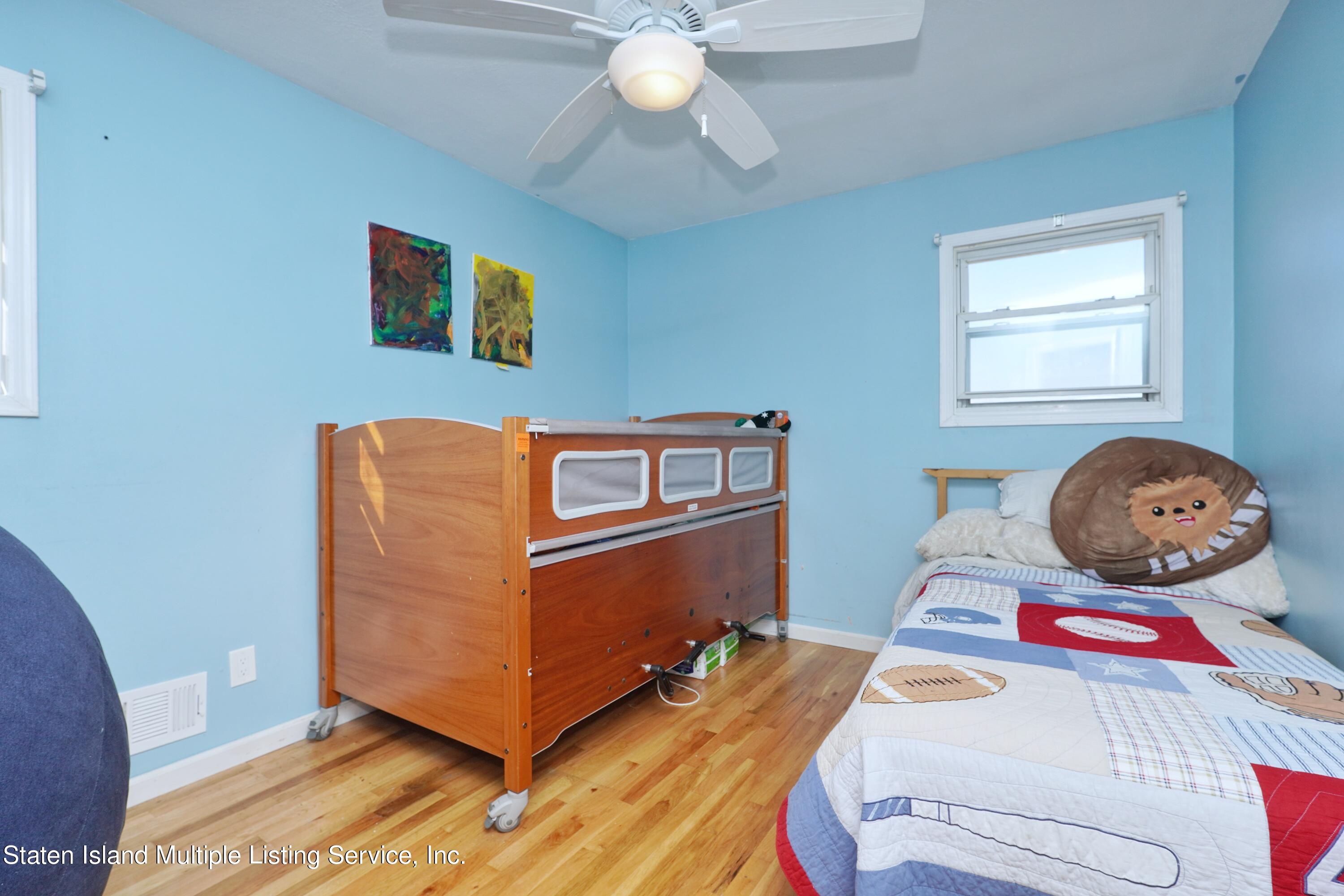 72 Middle Loop Road Staten Island, NY 10308 - Photo 35 of 38 a living room with furniture