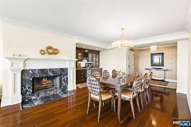 a view of a livingroom with furniture and a fireplace