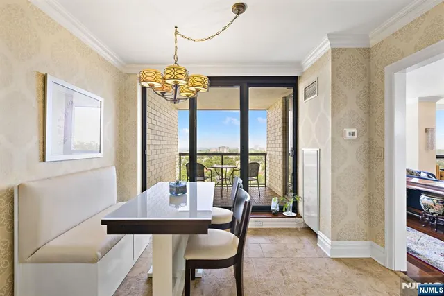 a view of a dining room with furniture window and outside view